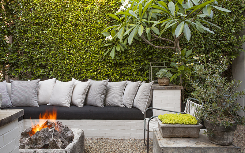 lounge area around a backyard fire pit