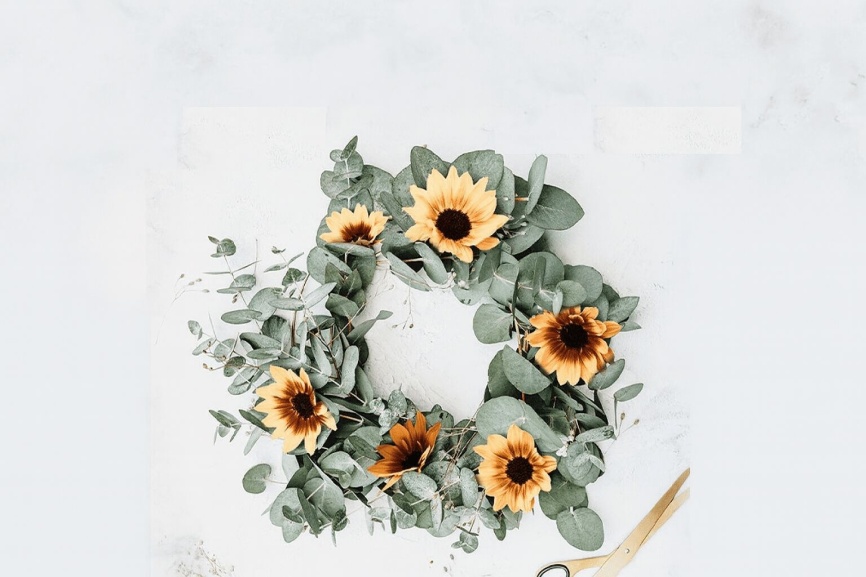 SunBelievable DIY Brown Eyed Girl Wreath" with an image of a wreath of sunflowers.